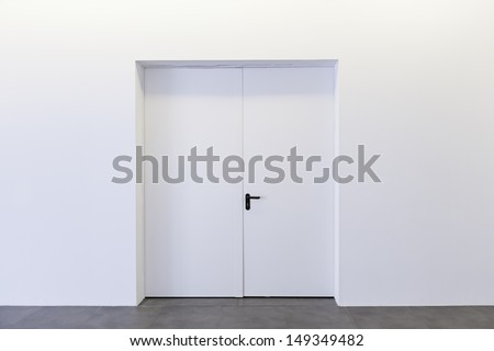 Closed door white building interior walls, construction Royalty-Free Stock Photo #149349482