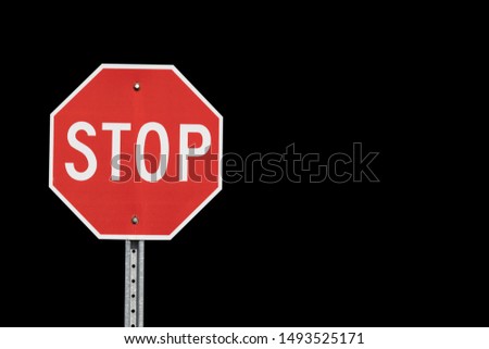 stop sign isolated on black