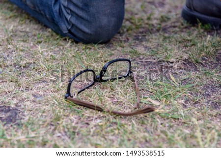 Glasses on the grass in the park