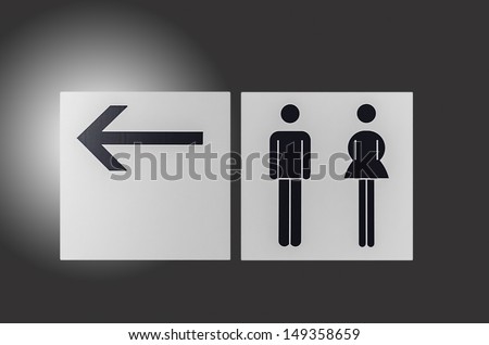 Toilet sign with arrow ,isolated background