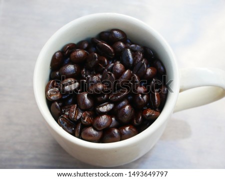 Ceramic Cup full roasted coffee beans