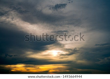 Beautiful sunrise sky. Golden, grey, and white sky. Colorful sunrise. Art picture of sky at sunrise. Sunrise and clouds for inspiration background. Nature background. Peaceful and tranquil concept.