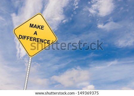 Motivational and leadership concept with message of Make a Difference sign board against blue sky and copy space 