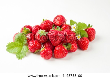 Fresh ripe strawberries offered as closeup on white background with copy space – isolated 