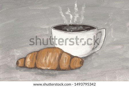 
cup of hot coffee and croissant