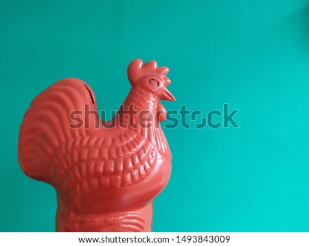 Piggy bank with a shape like a chicken