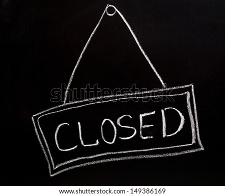 Closed sign made on a blackboard