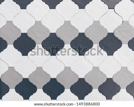 real photo white,gray, black tile Seamless surface design with ogee ornament. Oriental traditional pattern with repeated mosaic. Tracery window wallpaper. Moroccan crosses motif. Arabesque digital