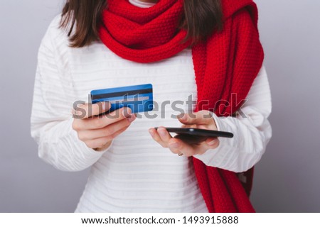 Close up photo of blue credit card and smartphone