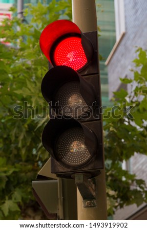 Traffic light in red for cars. You can not circulate. Madrid.
