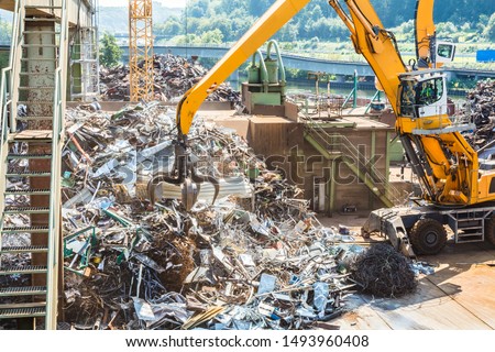 Heap of old metal and equipment for recycling Royalty-Free Stock Photo #1493960408