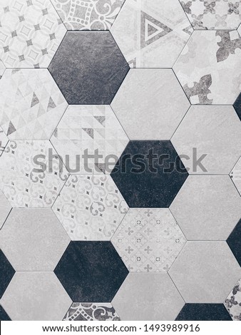 real photo of white beige black hexagonal tiles wall of the bathroom Non-repeating pattern