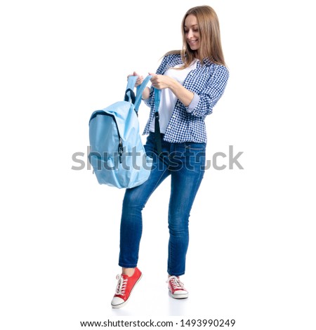 Woman in casual clothing student with backpack standing looking smiling on white background isolation