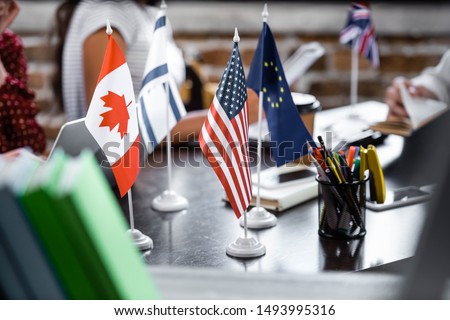 selective focus of flags of america, canada, european union and israel 