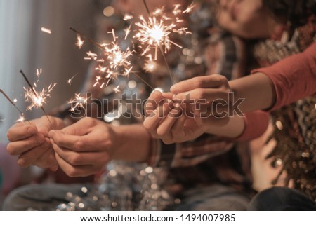 Couple people are celebrating christmas and holidays happily near beautifully decorated christmas tree, christmas concept
 Royalty-Free Stock Photo #1494007985