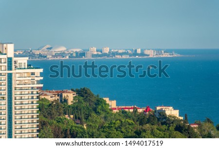 View from the center of Sochi to the sea and Adler. Aerial view of a coastal town and sea. Royalty-Free Stock Photo #1494017519