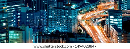 Aerial view of a highway interesection in Minato, Tokyo, Japan at night
