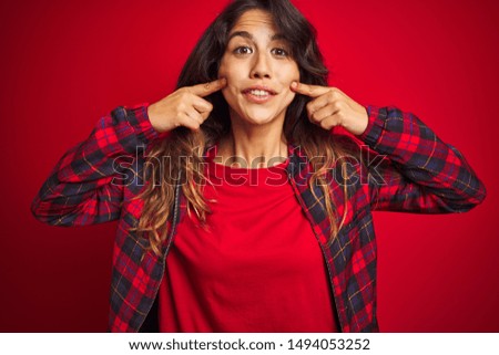Young beautiful woman wearing casual jacket standing over red isolated background rubbing eyes for fatigue and headache, sleepy and tired expression. Vision problem
