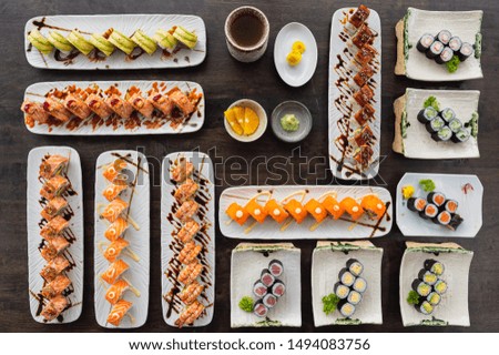 Top view Variety of Japanese maki sushi roll set seafood with vegetable