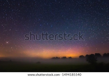 Starry sky with light Aurora borealis lights