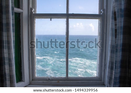 Window over the water, view from the Mizen Head light house West Cork Ireland over the Atlantic ocean. Royalty-Free Stock Photo #1494339956