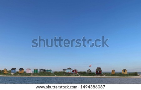 island of aero denmark with colorful beach houses Royalty-Free Stock Photo #1494386087