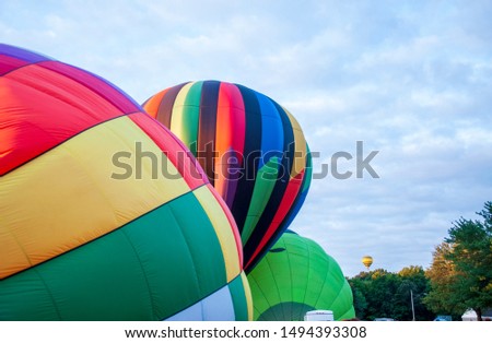 Beautiful Colorful Hot Air Balloon getting inflated and ready to fly
