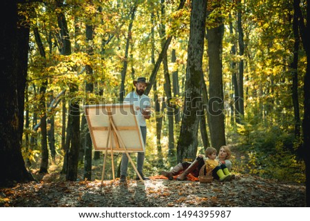 Start new picture. Capture moment. Beauty of nature. Bearded man woman and son relax autumn nature. Drawing from life. Painter artist with family relaxing in forest. Art concept. Painting in nature.