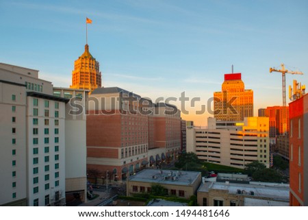 San Antonio city skyline including Hotel Contessa, Westing Riverwalk, Drury Plaza Hotel and Tower Life Building at sunrise in downtown San Antonio, Texas, USA. Royalty-Free Stock Photo #1494481646