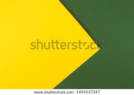 Abstract geometric paper background. Green yellow trend colors mock up. Minimal fashion concept. Flat lay, Top view. Copy space