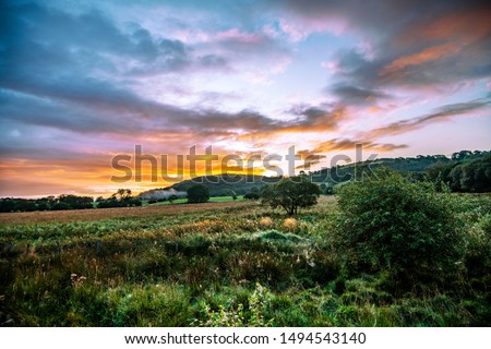 Dawn over the beautiful post-glacial landscape at Cors Caron National Nature Reserve, Tregaron, Ceredigion, Wales Royalty-Free Stock Photo #1494543140