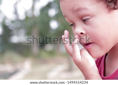 little boy picking his nose stock image stock photo