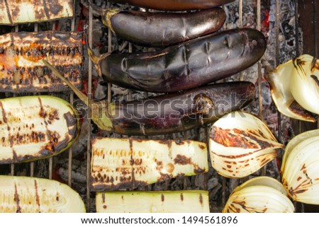 Vegetables On Barbecue Rack. Picnic. Grilling Outdoors At Summer Weekend. Barbecued Fresh Onion With Eggplant And Zucchini