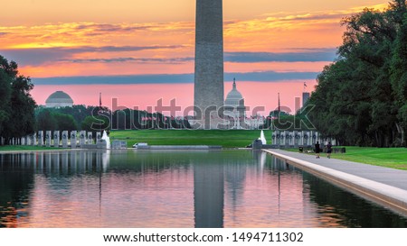 Washington, DC, Washington Monument and US Capitol Building at sunrise USA.