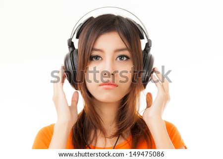 Young Asian woman with a audiophile Headphone
