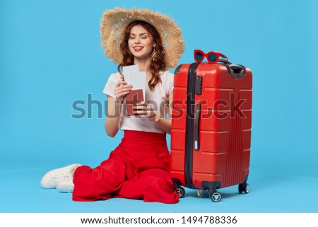 Beautiful woman red suitcase luggage flight travel tourism