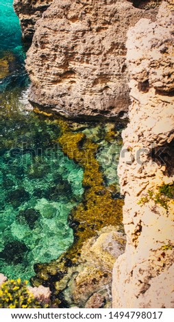 Beautiful turquoise water, coral reef and cliffs