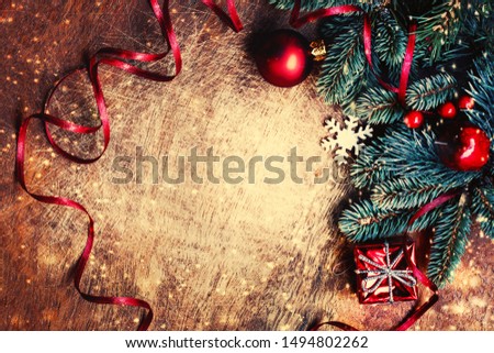 Christmas background with festive decoration on dark wooden board.  Flat lay, Top view. Xmas creative Greeting Card