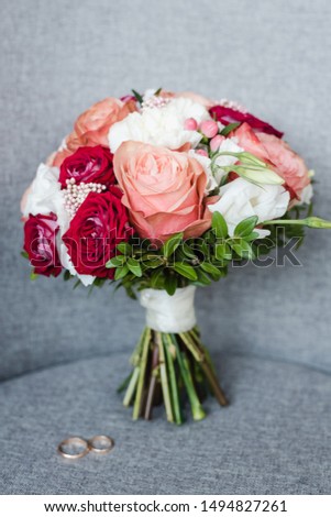the bride's bouquet, bridal bouquet of roses, wedding rings, wedding rings with a bouquet, wedding day
