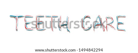 The word „teeth care“ written with  blue, red and white striped toothpaste, toothpaste letters