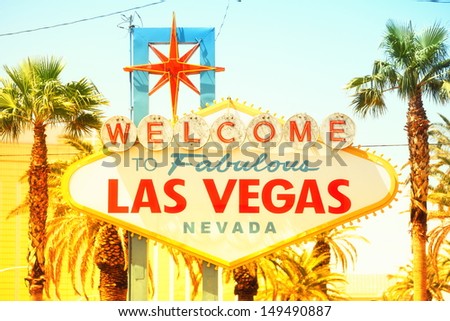 Las Vegas sign. Welcome to Fabulous Las Vegas sign, Nevada. Vintage retro style with warm glowing sun sunshine.