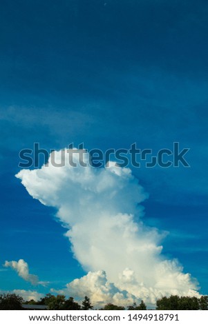 Large clouds in the blue sky