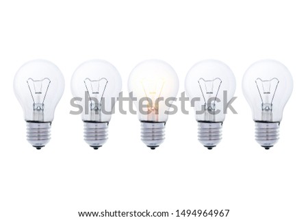 Light bulb, isolated, Glowing yellow light bulb, busienss idea concept. 5 bulbs are lined up, but only one of them has light, which can be compared to creativity concept.