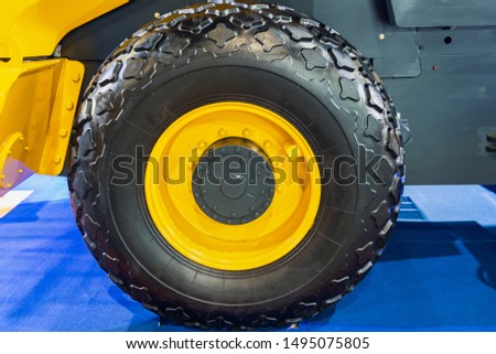 Large size wheels and tires of different sizes for tractors