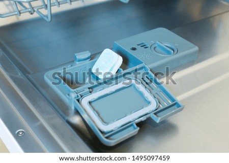 Eco tablet detergent for dishwasher. Disposable tablet in plastic that dissolves.