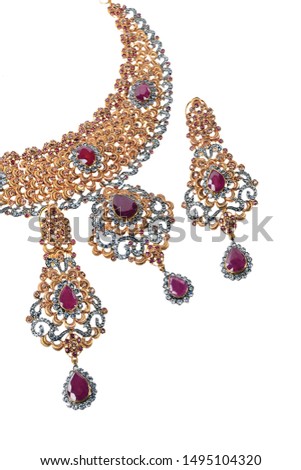 Gold necklace set with Ruby stones