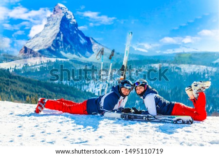 Handsome couple in the winter scenery