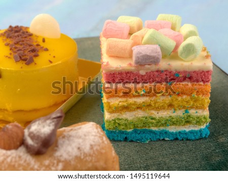 Beautiful and delicious cakes.Black coffee.On light background