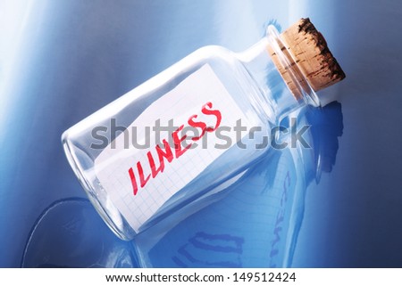 An artistic concept of a message in a bottle saying "illness"