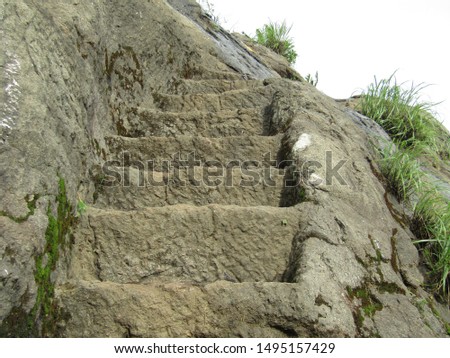 Asheri fort, the carved stone steps and steps made by Shivaji Maharaj on the hill.